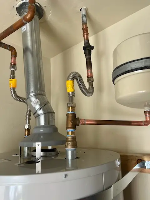 Water heater installation and plumbing repair in Pinewood Place